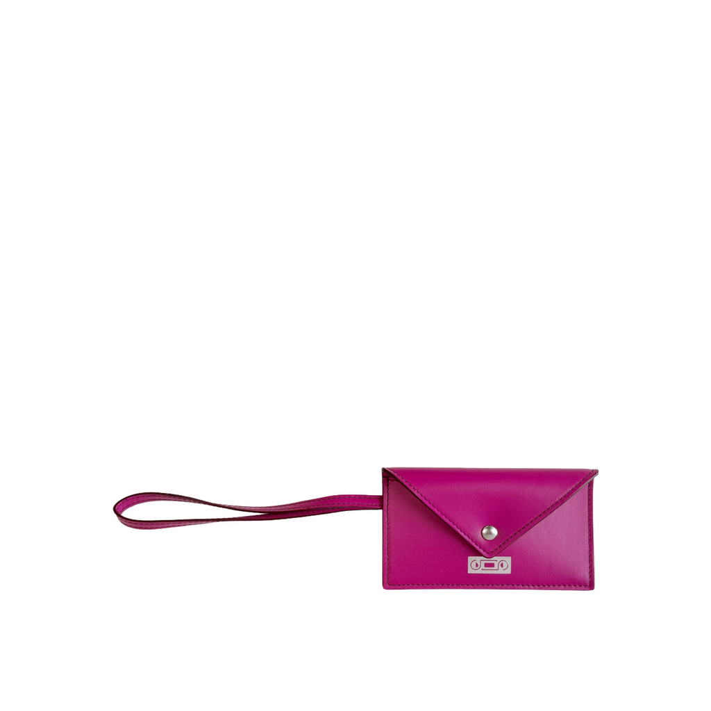 The Business Card Holder by Studio Tondini in refined orchid leather, featuring a silver foil logo stamp and a practical wrist strap, handcrafted in Italy.
