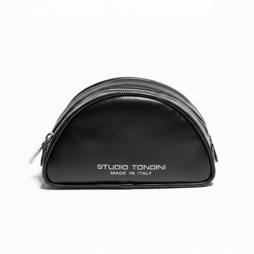 The Valentina Toiletry by Studio Tondini. Front view of black refined leather pouch, handcrafted in Italy.