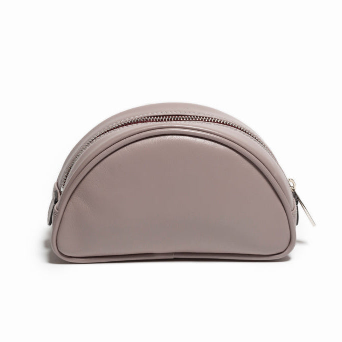 The Valentina Toiletry by Studio Tondini. Back view of light grey handcrafted leather pouch, discreet and elegant.