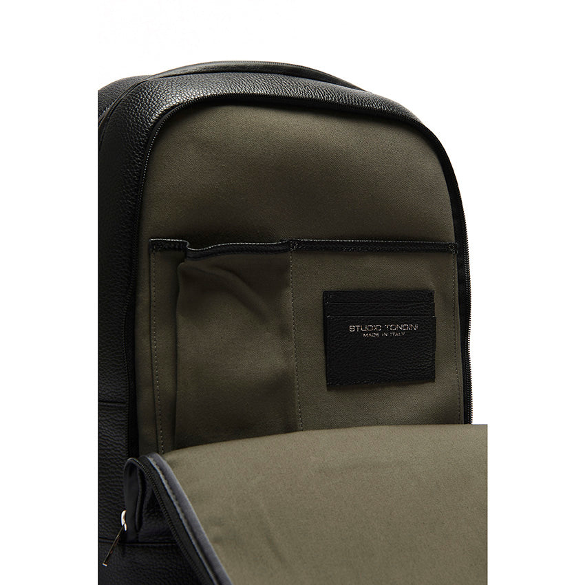 Interior detail of The Simona Monochrome Backpack, highlighting refined organisation, double zip opening, and cotton lining.